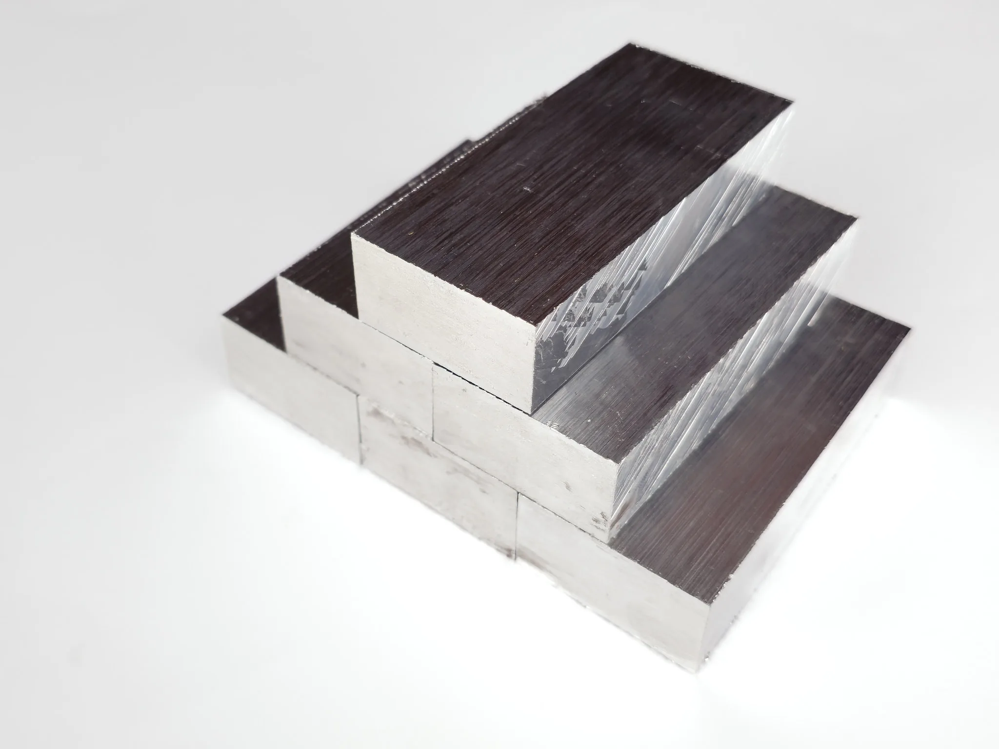 High quality primary aluminum ingots stacked in industrial warehouse